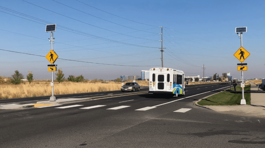 An STA bus traveling down the street in Airway Heights.